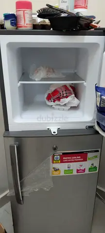 Small used 2-door refrigerator with freezer compartment - working condition