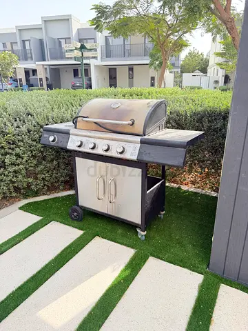 Used4 Burner Gas BBQ Grill with Side Shelf and Storage Cabinet