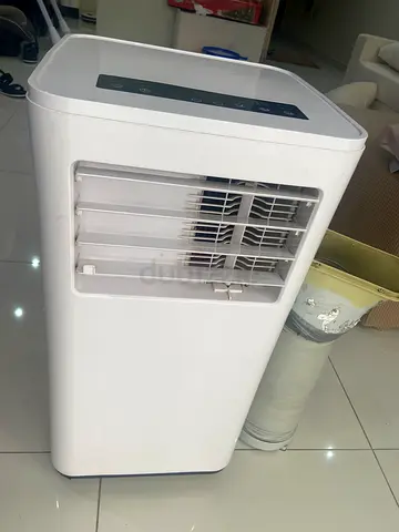 Portable air conditioner unit with exhaust hose - used, but working perfectly.
