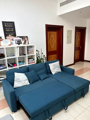 Blue L-shaped Convertible Sofa Bed - Good Condition