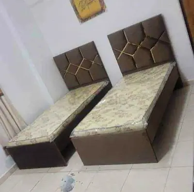 Pair of single beds with headboards and mattresses - good condition