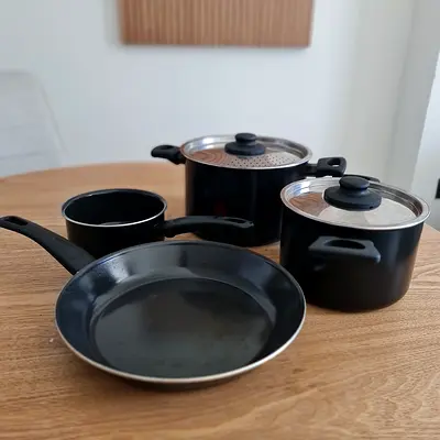 Set of non-stick saucepans and frying pan with lids - good condition