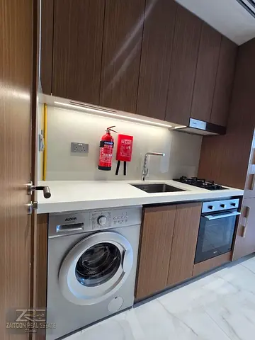 very nice studio with balconey kitchen appliances