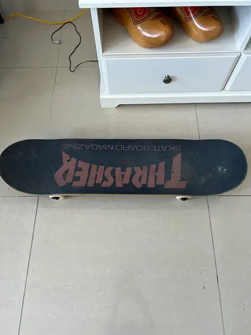 Used Thrasher Skateboard Deck with Trucks and Wheels