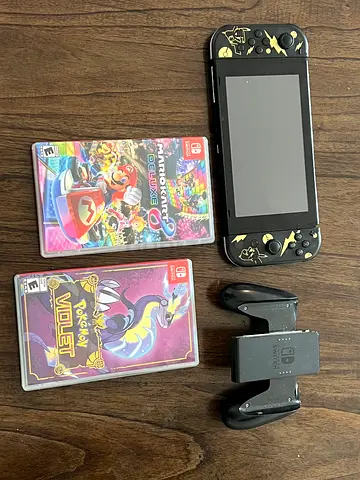 Nintendo Switch LED with games and joycons