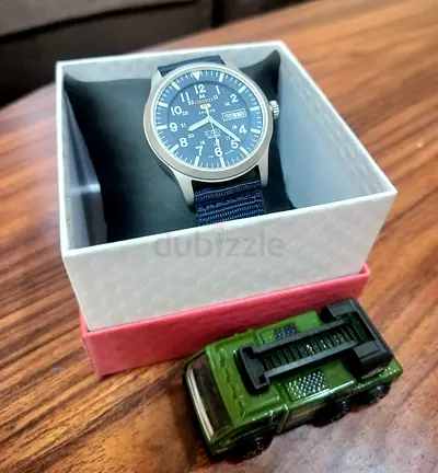 Seiko 5 Sports SNZG11K1 automatic watch with a blue dial and nylon strap. 100m water resistance