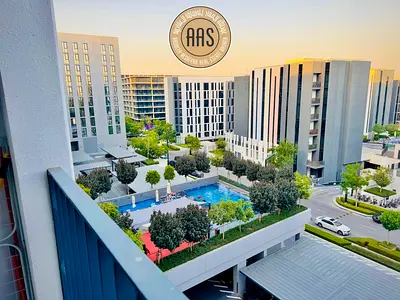 Pool view 1BHK in Boulevard Building With Kichen Appliance +All Amenities
