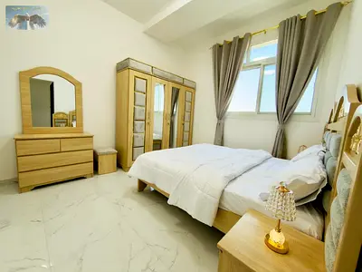 2BR furnished, first occupancy, new furniture, 3 baths, balcony, prime Al Ittihad St location near Ramez Mall & Al Ain Hotel.