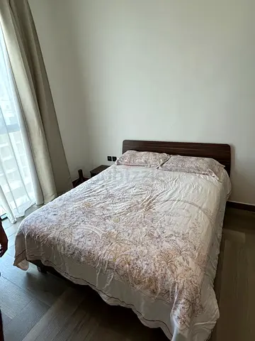 Queen bed frame with mattress and bedding - good condition