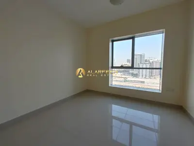 شقة بغرفتي نوم | برج رمال JVC | غير مفروشة | إطلالة على المدينة