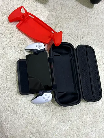 PS portable with carrying case and grip attachments — good working condition