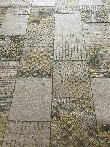 Used Patchwork-Style Modern Area Rug — Neutral Tones, Good Condition