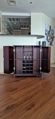 Compact Wooden Wine Cabinet with Glass Rack and Storage