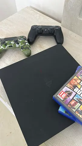 Sony PlayStation 4 Slim with 2 Controllers and Games - Good Working Condition