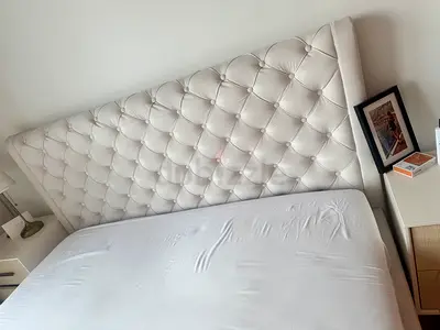 Large tufted upholstered king-size headboard in beige/cream with storage inside fits 200x180 cm