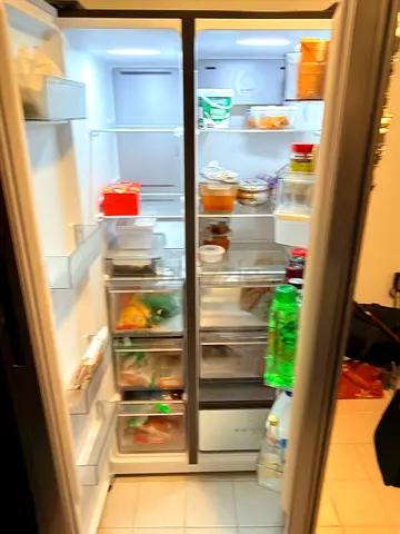 Double-door refrigerator (side-by-side) in good working condition