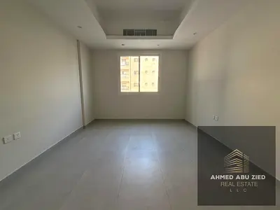 For rent in Al Hamidiya, Ajman: one bedroom and living room, 2 bathrooms, balcony, close to Ajman University, 38,000 AED in 4 installments, one month