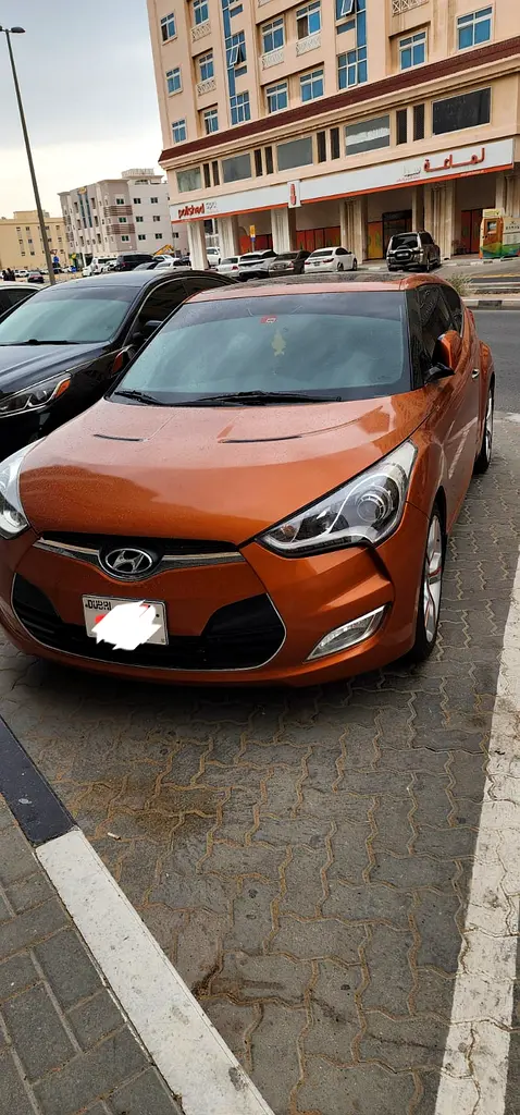 Hyundai Veloster 2014 — photo 1 of 7