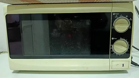 Used Countertop Microwave Oven - Beige, Mechanical Dials