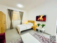 Furnished two-bedroom apartment with a living room for rent in Ajman, clean and tidy furnishings. Lo
