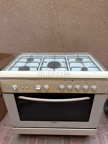 Bosch 90 by 60: Freestanding stainless steel gas oven and stove - good working condition