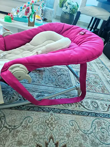 Pink baby bouncer/rocker - gently used