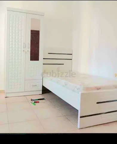 Brand New Single white bed frame with mattress and matching wardrobe