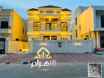 For sale: Classic villa in Al Helio 2 area, Ajman (two floors + roof) at a price that includes registration and ownership fees. Located near the mosqu