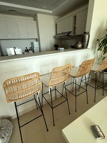 Set of 4 Rattan-style Bar Stools with Black Metal Legs - excellent condition from home and soul