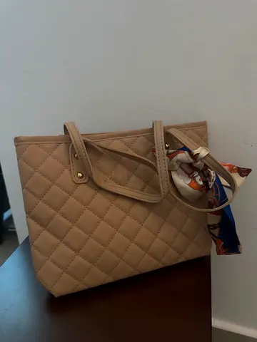 Beige woman’s hand bag