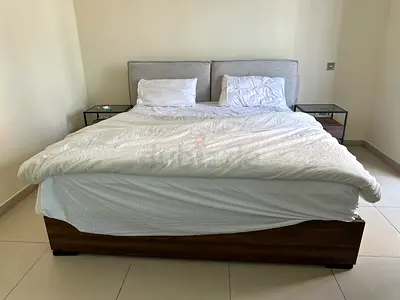 King size bed with both side table and dressing table and mattress too