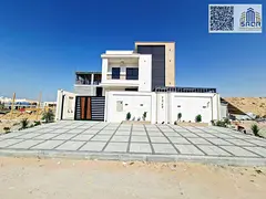 Deluxe villa, registration and ownership fees included, on the main street, ready to move in, in Ajm