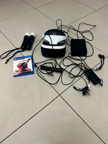 PlayStation VR headset with two Move controllers and camera + game