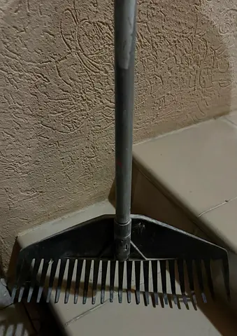 Used metal garden rake Fiskars  - good condition