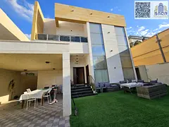 Villa for sale in Al Muwaihat 3 - Modern design and central air conditioning - Land area 5000 sq ft