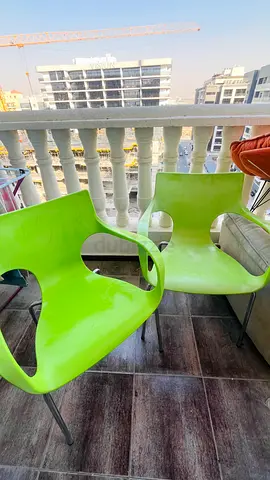 Set of 2 Lime Green Plastic Dining/Patio Chairs with Metal Legs
