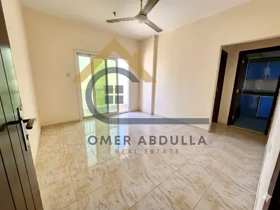 Spacious 1BHK Apartment with Balcony for Family | Prime Location in Muwaileh