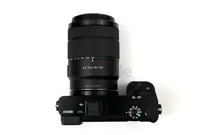 Sony Alpha a6100 Mirrorless Camera with 18-135mm Lens (4K) with 2 Sony batteries+charging adaptor