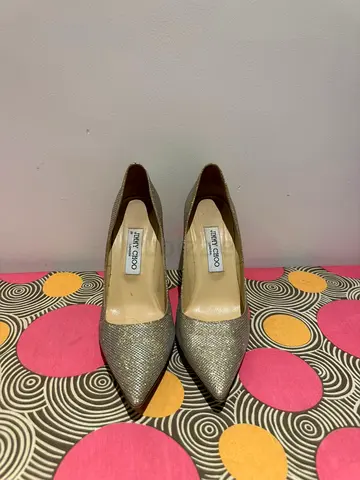Jimmy Choo, original,  golden glitter pointed-toe high heel pumps (womens) - gently used