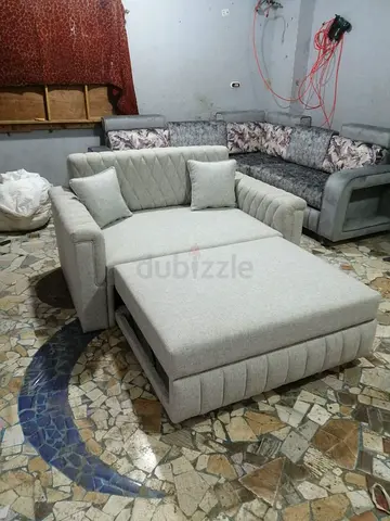Light grey convertible single sofa bed with ottoman (like-new)