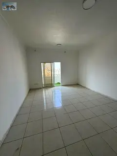 1BR apartment in Rashidiya 3, spacious, central AC, built-in wardrobes, balcony, open view, natural