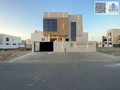 Modern villa for sale in Al Bahia, elegant design, price includes registration, ownership, electricity, and water fees.