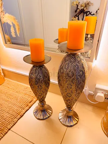 Pair of larache pillar candle holder with yellow candles