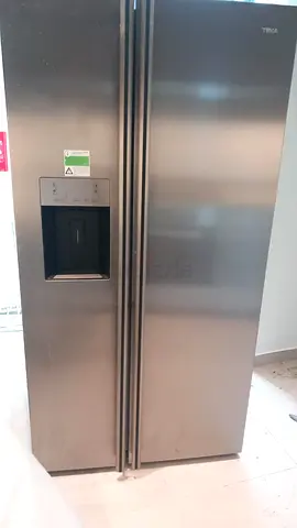 Teka American-style side-by-side refrigerator stainless steel finish and With Water Dispenser