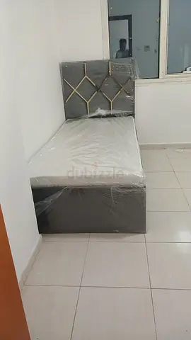 Brand new single bed with mattress
