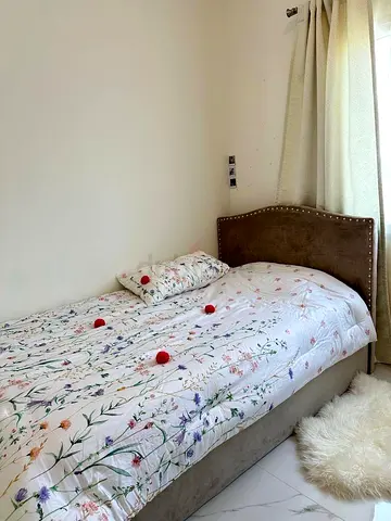 Single upholstered bed with headboard - good condition