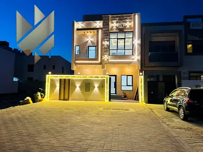 Villa for sale in Al Zahia, Sharjah, featuring 6 master bedrooms, located on a main road, with regi