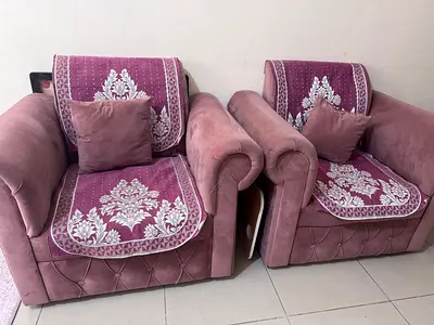 Pair of sofa armchairs with patterned seat covers