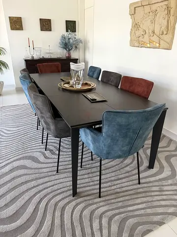 Modern Black Dining Table with 8 Velvet Upholstered Chairs and Matching Rug