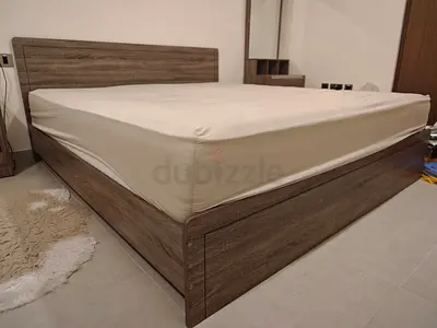 King-size wooden bed frame with storage, good condition